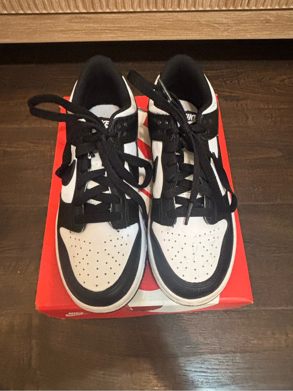 Nike Kids Black and White Low-Top Sneakers with Red Accent